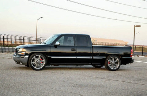 Side view of Lowering Kit For Chevy Silverado Sierra 1500 99-06 With 5 Inch Front Drop Spindles And Coil Springs, 7 Inch Rear Flip Kit