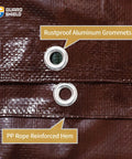 Close-up of rustproof aluminum grommets on a 7 mil Brown Green 24x24 Ft Tarp, showing reinforced hem, for outdoor waterproof use.