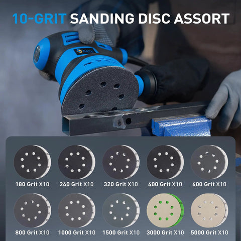 Get That Shiny Finish With These 100 Assorted 5 Inch Wet Dry Sanding Discs Featuring 8 Holes Hook And Loop Design For Wood Auto Body Metal Work ranging From 180 To 5000 Grits Perfect For Orbital Sanders And Serious Detailing Jobs, shown with sanding discs laid out next to an orbital sander.