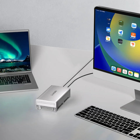 Lightning Fast Usb4 To U2 Nvme Ssd Enclosure for External Thunderbolt Drive connected to laptop and monitor on desk.