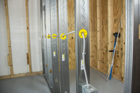 Steel studs in construction with Bulk Nail Plate One And A Half Inch By Two And A Half Inch Tough As Nails Durable Steel Connector Plate