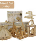 Leonardo Da Vinci Catapult Kit Build a Working Wooden Siege Engine with helicopter and tank models in packaging.