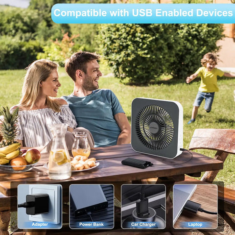 Family enjoying outdoor picnic with 10 Inch Box Fan With 3 Speeds And 8 Hour Timer Quiet Square Window Fan in background