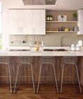 Clear The Counter Clutter With This Slick Wooden Acrylic Display Shelf in a modern kitchen setting with stainless steel stools.