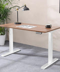 Fromann Dual Motor Standing Desk Frame With 3 Tier Legs Electric Height Adjustable Base For Home And Office White with wood top.