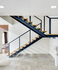 8 Inch Square Slim Recessed LED Downlight, 5 Selectable Color Temperatures, 1600 Lumens, No Sweat Switch Install, Top Shelf White Trim installed in modern staircase.