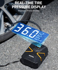 Portable 12V Digital Tire Inflator With Auto Shutoff, Real Time Pressure Display next to car tire on asphalt