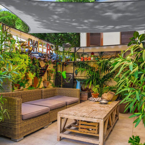 Outdoor Shade Sail Rectangle 10 ft by 13 ft UV Block Canopy installed over garden patio seating area