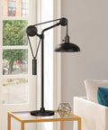 Dope 33.5 Inch Tall Industrial Table Lamp With Solid Wheel Pulley System And Blackened Bronze Metal Shade on living room table.