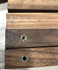 Close-up of 12 Pack Walnut Wood Drawer Pulls, 5.12 Inch Long, Two Hole Cabinet Hardware With Screws, showing polished solid walnut texture