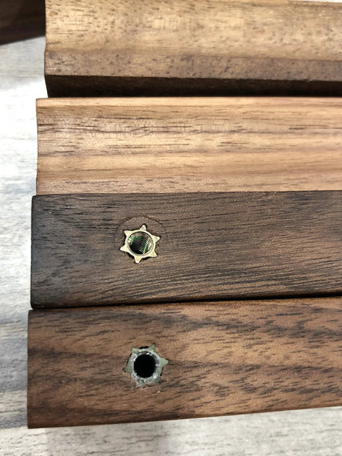 Close-up of 12 Pack Walnut Wood Drawer Pulls, 5.12 Inch Long, Two Hole Cabinet Hardware With Screws, showing polished solid walnut texture