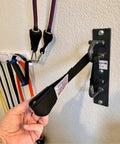 Top Tier Dual Hook Resistance Band Wall Anchor For Sick Home Gym Setups With Heavy Duty Wood Screws Included and Versatile Modular Mount. Steel mount with black strap.