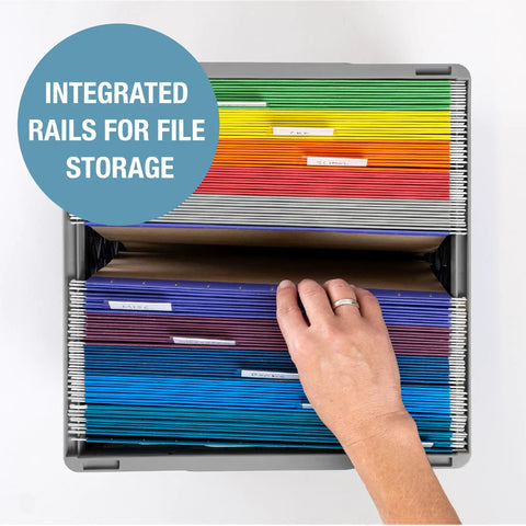 Top view of hand organizing files in a Neptune Blue Collapsible Milk Crate 3 Pack 25L Each, showing rainbow-colored folders.