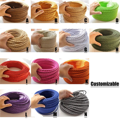 Various colored industrial ropes displayed in coils, customizable options available, labeled with letters A to N, hand touching each coil.