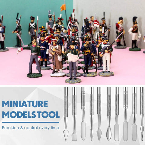Five Piece Miniature Sculpting Tools Set with stainless steel double-headed craft tools shown beside painted model figures for tabletop games.