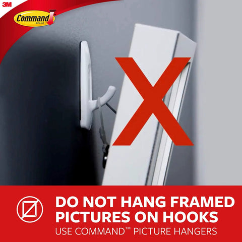 Side view of a hook on a wall with a red X, warning against hanging framed pictures on hooks. Use Command picture hangers instead.