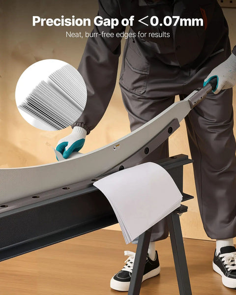 Worker using Beefy 39 Inch Bed Width Manual Guillotine Shear For Metal Sheets Benchtop Cutter with Stand, cutting metal