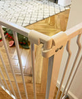 Easy Walk Through Safety Gate For Doorways And Stairs With Auto Close And Hold Open Features 36 Inch Tall Fits 29.1 To 38.5 Inch Openings Graphite Finish No Fuss Quick Pressure Mounted Setup That Protects Walls gate latch detail.