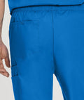 Back view of Relaxed Fit 7 Pocket Elastic Cargo Scrub Pants For Men With Stretch Waistband And Drawstring Durable Go To Workwear