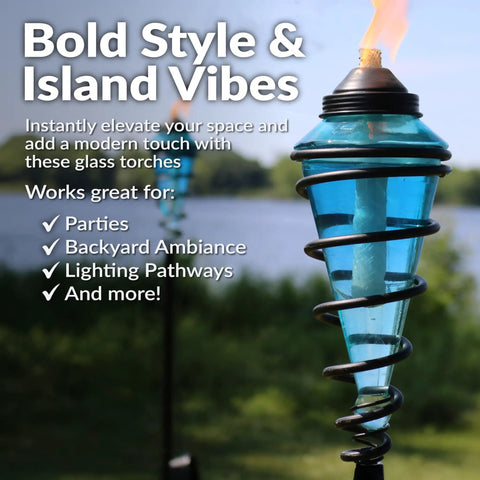 Two Pack Glass Patio Torch Set with blue glass vessels and metal casings, perfect for garden or backyard ambiance.