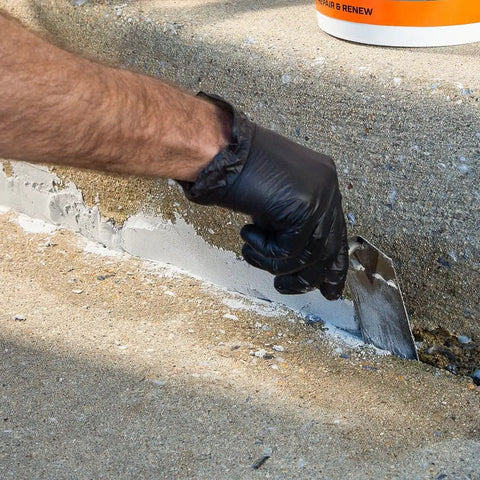 Gray Ready Mixed Concrete Patch For Fixing Cracks And Holes In Interior Or Exterior Surfaces Non Shrinking Repair Formula applied on step