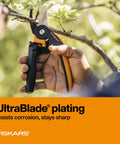 Close-up of using PowerGear2 Pruning Shears With Rolling Handle For Effortless Pruning Three Quarters Inch Cut Capacity Bypass Pruner