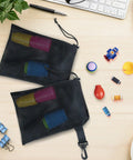 10 Pack Mesh Drawstring Bags With Clips Grab And Go Portable Nylon Storage Pouches containing toys on a desk