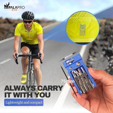 Cyclist holding lightweight 20 in 1 bike multitool kit with chain breaker for MTB repairs, compact size 40x75mm, chrome vanadium.