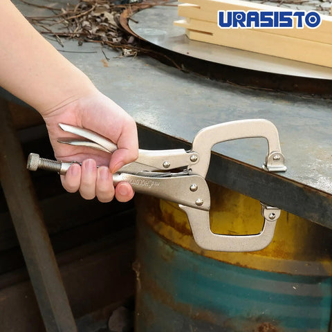 Person using 11 Inch C Clamp Locking Pliers With Swivel Pads Beefy Heavy Duty Welding Pliers on a metal surface