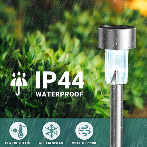 Close-up of 16 Pack Solar Lights Outdoor Waterproof Stainless Steel LED Garden Lights IP44 under rain in garden