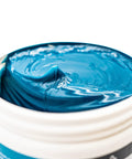 Close-up of Go-To Premium Mineral Base Marine Grease With Water-Resistant Formula in 16 oz tub, showing texture and color.