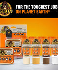 Gorilla Wood Filler Kit with cans and tubes in various wood tones against orange background, for repairs and DIY projects.