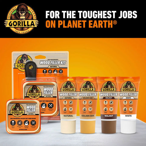 Gorilla Wood Filler Kit with cans and tubes in various wood tones against orange background, for repairs and DIY projects.