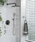 Rain Shower System With 10 Inch Round Showerhead And Handheld High Pressure Faucet Set In Matte Black Finish in modern bathroom