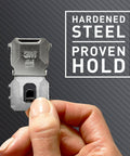 Hand holding Heavy Duty Drywall Picture Hanger That Holds Up To 65 Pounds, Installs In Seconds With A Quick Push, No Tools Required.