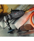 Heavy Duty Angle Air Die Grinder With 12000 RPM And 0.4 Horsepower Motor on metal surface with sanding discs and air hose.