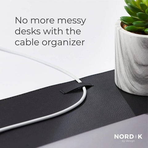 Pebble Black Leather Desk Mat With Cable Organizer 35 By 17 Inches, Premium Vegan PU Desk Pad And Mouse Mat close-up with cable