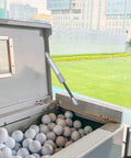 Heavy Duty Gas Struts 2 Pack 8 Inch 55 Lb Lift Supports Silver Tone Badass Grip Stay For Rv Cabinets Car Hatches Toolboxes Coolers And Wood Boxes Slick Finish, installed on a golf ball storage box.