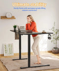 Yihayo 55 Inch L Shaped Electric Standing Desk with a sturdy frame, shown in an ergonomic home office setting.