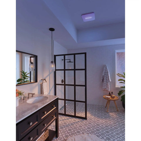 Bathroom with SurfaceShield Vital Vio Bathroom Exhaust Fan Grille With Disinfecting Violet Led Light in ceiling, white finish.