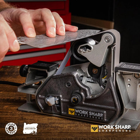 Ken Onion Edition Knife And Tool Sharpening System Mk2 with adjustable angles and blade grinding attachment on a benchtop.
