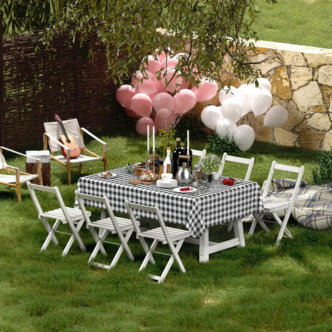 Outdoor setup with a Waterproof Vinyl Rectangle Table Cloth With Soft Flannel Backing, Spillproof And Wipeable Buffalo Check Black And White Table Cover For Dining, Kitchen, And Outdoor Use, 60 By 84 Inches on a table surrounded by chairs.