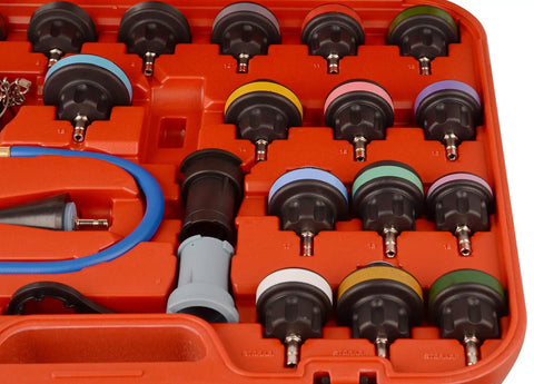 Slick Complete No Hassle Rig Ready 28 Piece Universal Radiator Pressure Tester Kit with hand pump and colorful adapters.