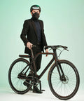 Road Ready Nano Light Hexagon Motorcycle Half Face Mask With Anti Pollution Filter worn by cyclist with bike in studio