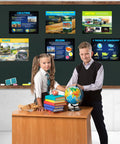 Students with globe and Six Geography Poster Set With Five Themes Of Geography For Social Studies Classrooms on bulletin board.