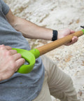 Man using digging fork from Three-Piece Small Spaces Gardening Kit With Border Spade, Digging Fork, And Round Point Shovel in garden