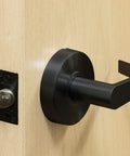 Heavy Duty Lever Style Interior Door Lock Grade Two Commercial Passage Lock With Oil Rubbed Bronze Finish Two And Three Quarters Inch Backset Cylindrical Construction UL Listed For Non Locking Interior Applications Durable Smooth Operation And Reliable installed on wooden door