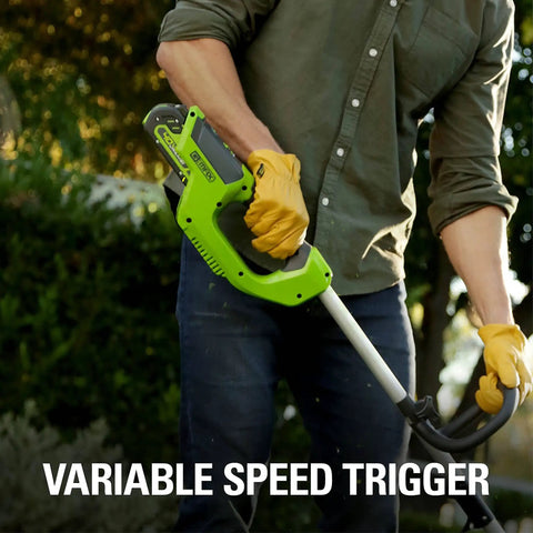 Person holding 40V Cordless String Trimmer With 12 Inch Cutting Path And Auto Feed Head Lightweight Weed Eater For Your Lawn And Yard A Real Workhorse Battery And Charger Not Included Model BST4000
