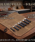 Durable Canvas Knife Roll Case For Outdoor Use And Camping, Waterproof 7 Pocket Knife Organizer displayed open on table