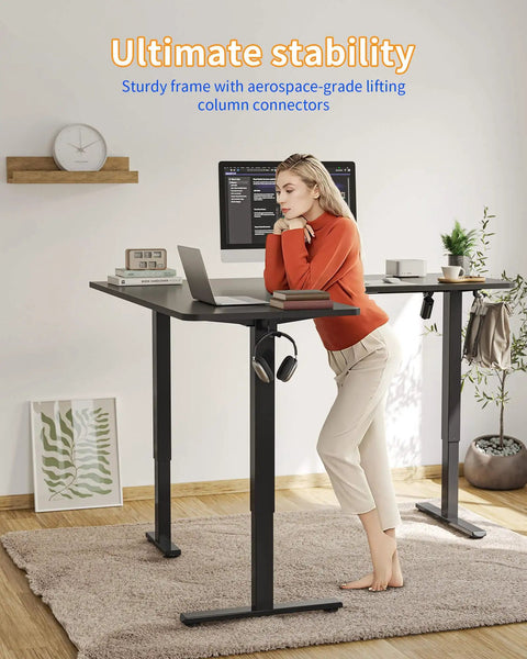 Boss Level Electric L Shaped Standing Desk Adjustable Height 63 X 55 Inches with sturdy frame and lifting connectors in home office.